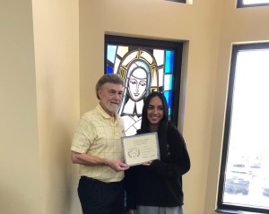 Raehana Anwar (on right) - Senior Division - 2nd place - receives her certificate and award from Dennis Patton.