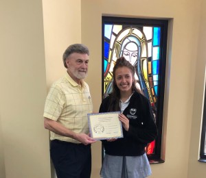 Grace Cassie (on right) - Senior Division - 2nd HM - receives her certificate and award from Dennis Patton.