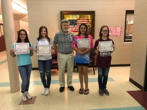 Four Benton Middle School students place in the 2019 Sybil Nash Abrams Student Contest (Junior Division). All four students attend classes under the instruction of Ms. Teresa Bond. (L-R Bella Crowe-2nd Honorable Mention; Addison Glaze-1st Honorable Mention; Dennis Patton, President of PRA; Makayla Blankenship-3rd place; and Mackenzie Burt-2nd place)