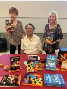L to R, Poet Laureate Suzanne Underwood Rhodes, Key-note Speaker Dr. Tyrone Jaeger, Marie Allison