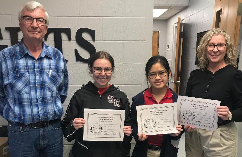 Senior Division Winners from Sacred Heart Catholic School in Morrilton receive their certificates from PRA Membership Chair Rick Houston